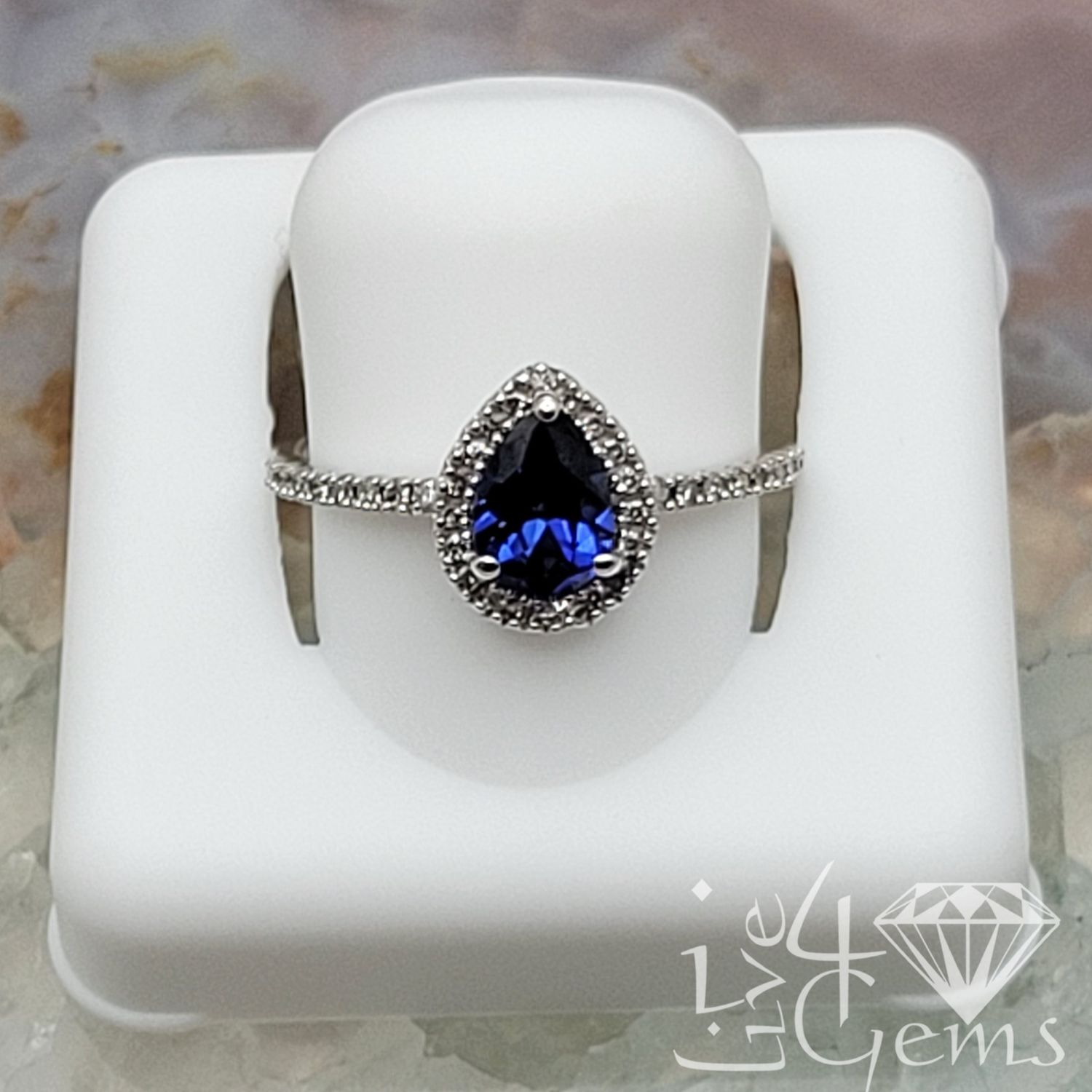 10ktW 1/6ctw Diamond 1ct Lab Sapphire Pear Ring
