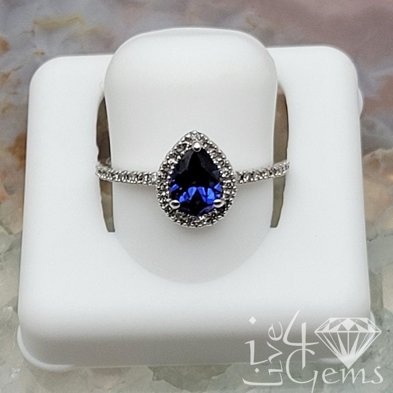 10ktW 1/6ctw Diamond 1ct Lab Sapphire Pear Ring