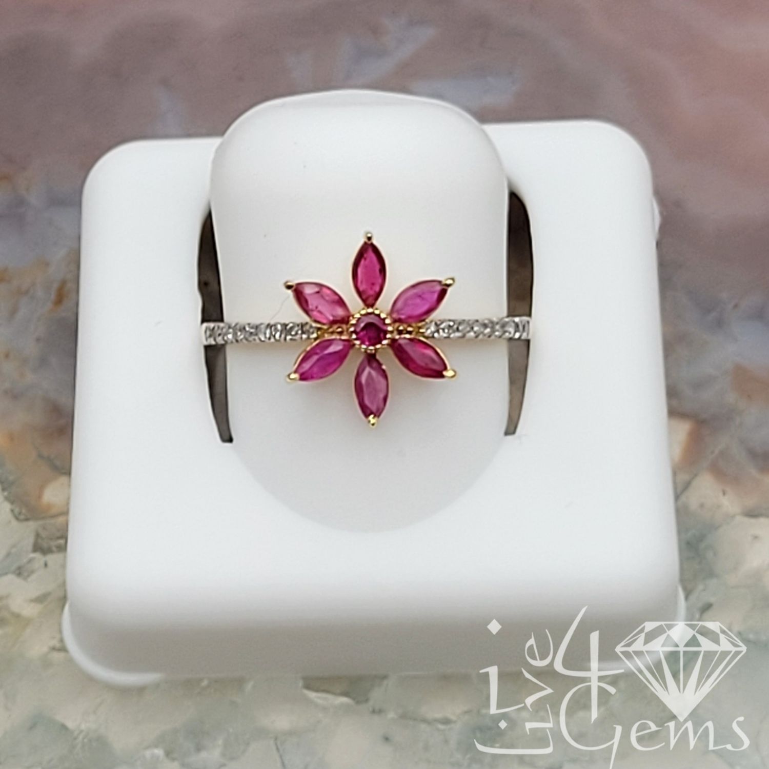 10kty 0.07ctw Diamond Ruby Flower Ring