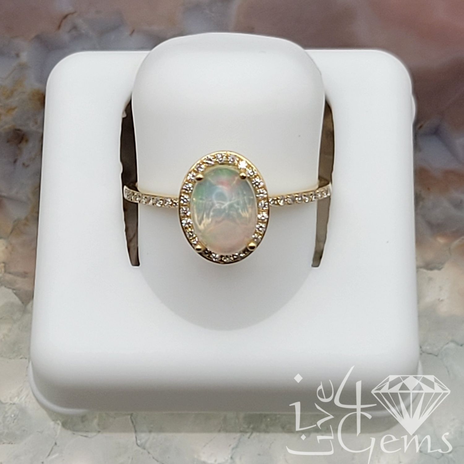 10kty 0.18ctw Diamond Halo Opal Ring