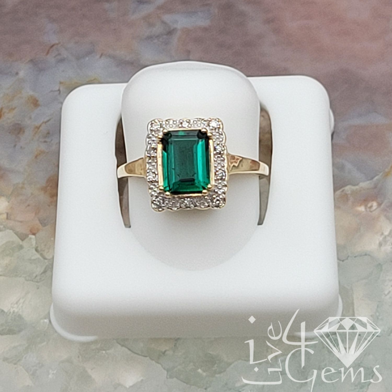 10kty 1/20ctw Diamond 2 1/2ct Lab Emerald Ring