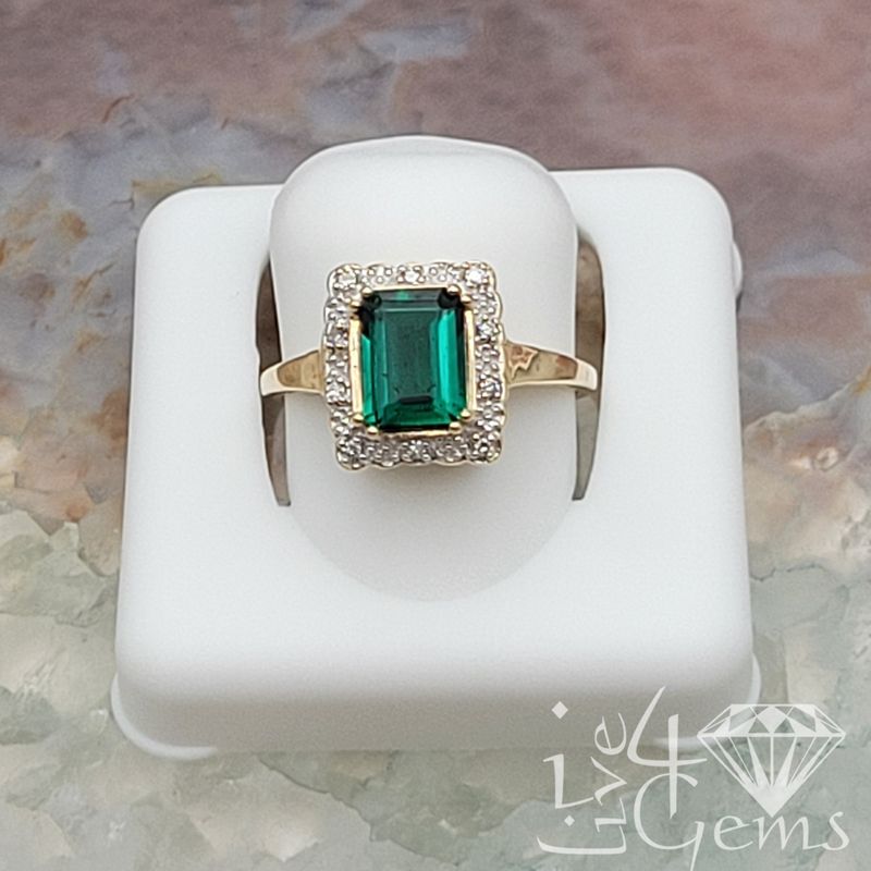 10kty 1/20ctw Diamond 2 1/2ct Lab Emerald Ring