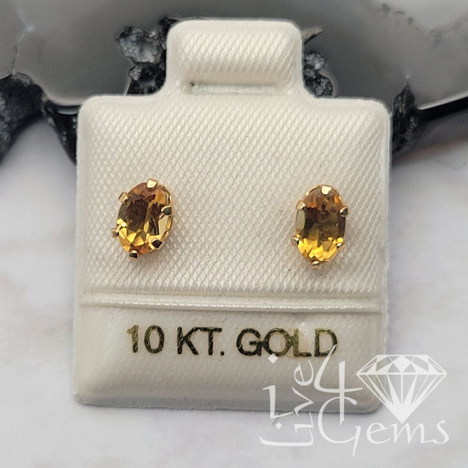 10kty 6x4mm 0.72ct Oval Citrine Stud Earrings