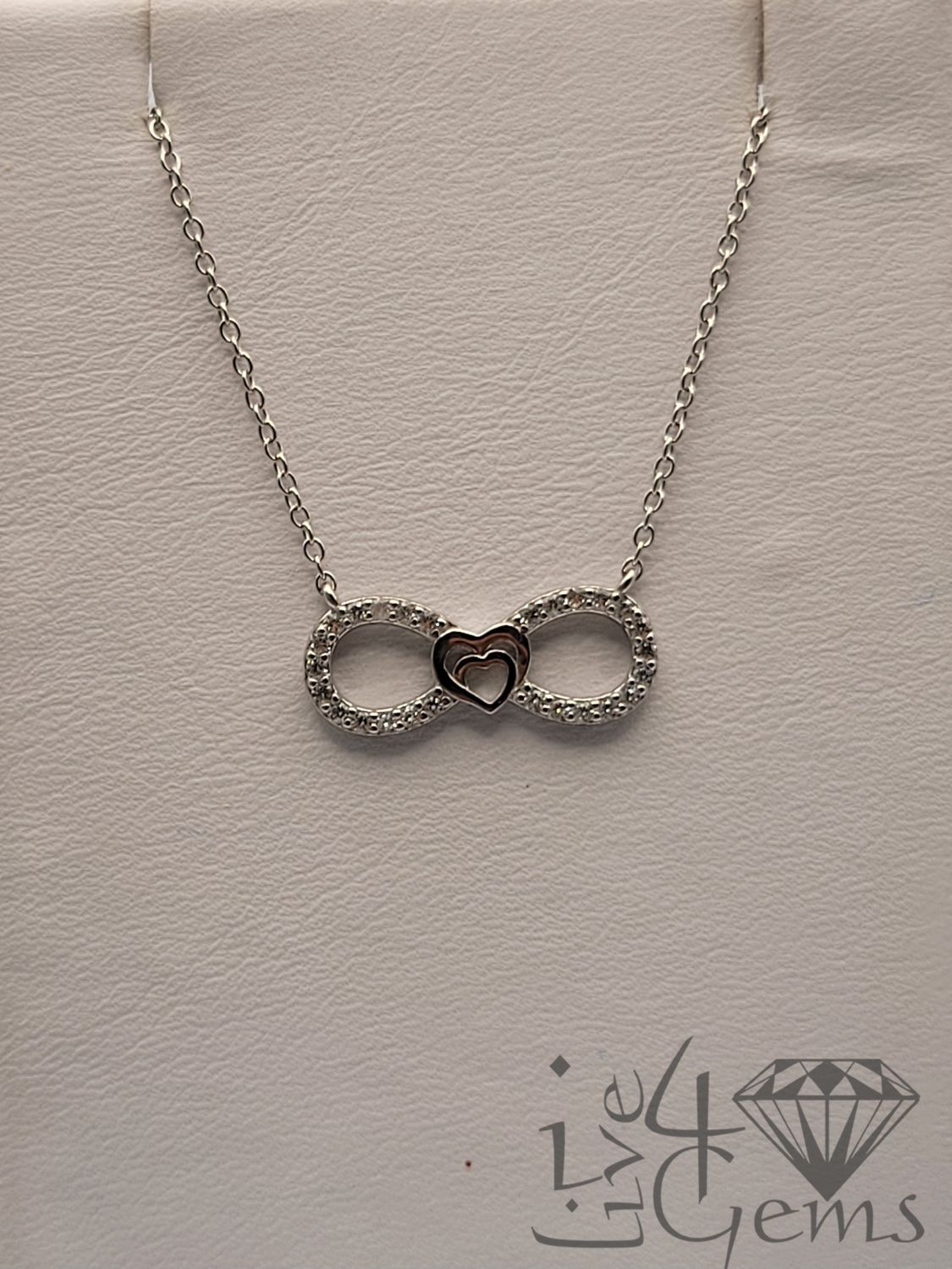 Silver CZ Infinity with Interlocking Hearts Pendant and Chain