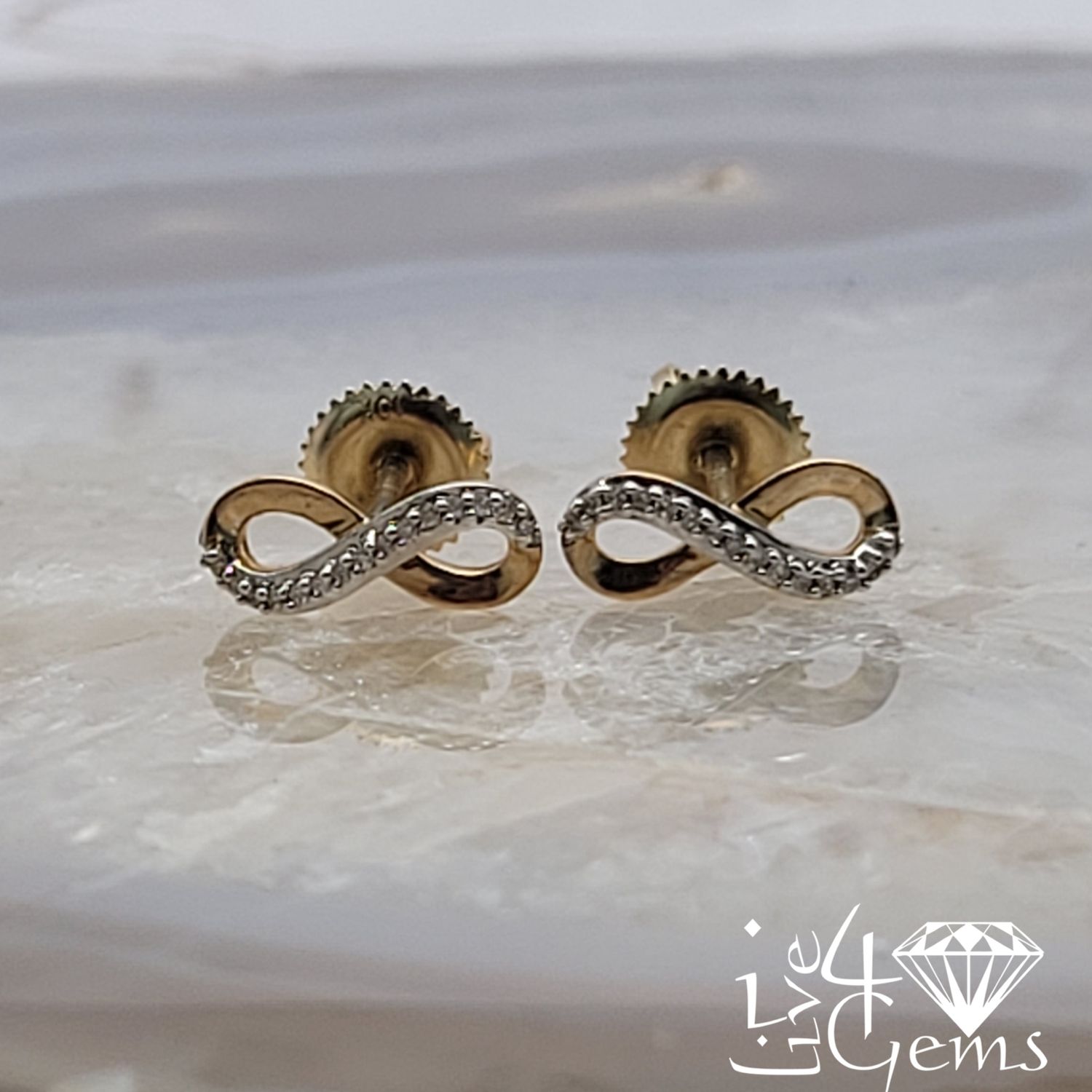 10kt 1/20ctw Dia Infinity Earring
