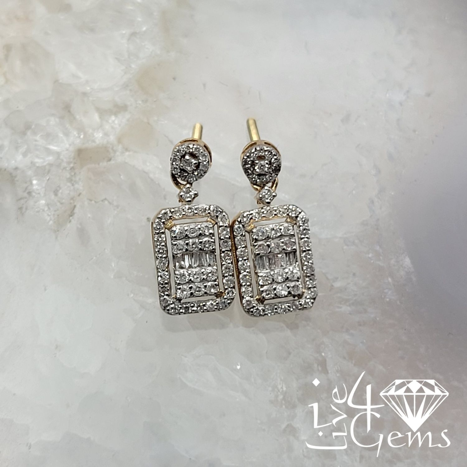 10kty 1/2ctw Emerald Cut Dangling Earring