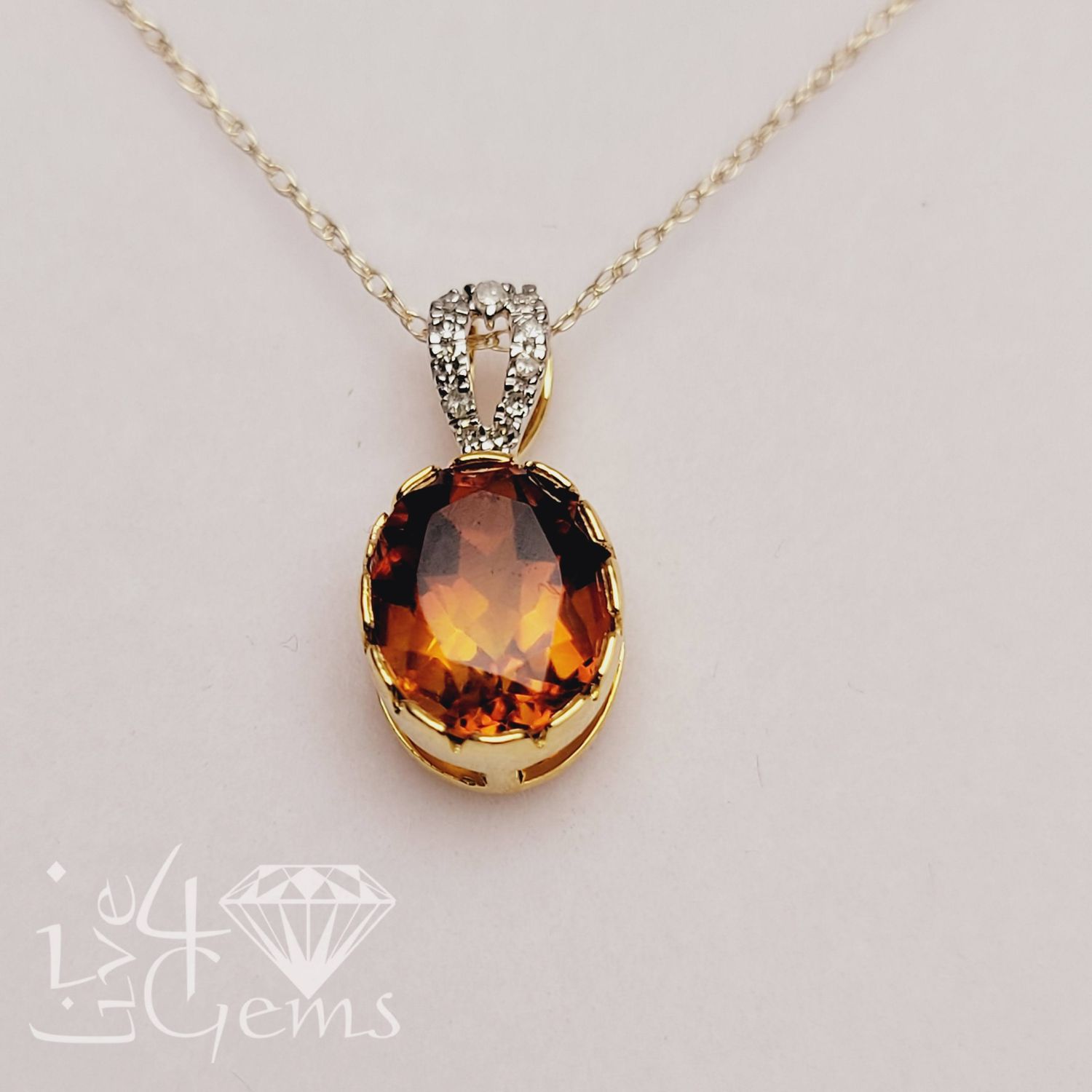 10kty 0.05ctw Dia Oval Bezel Chain Citrine