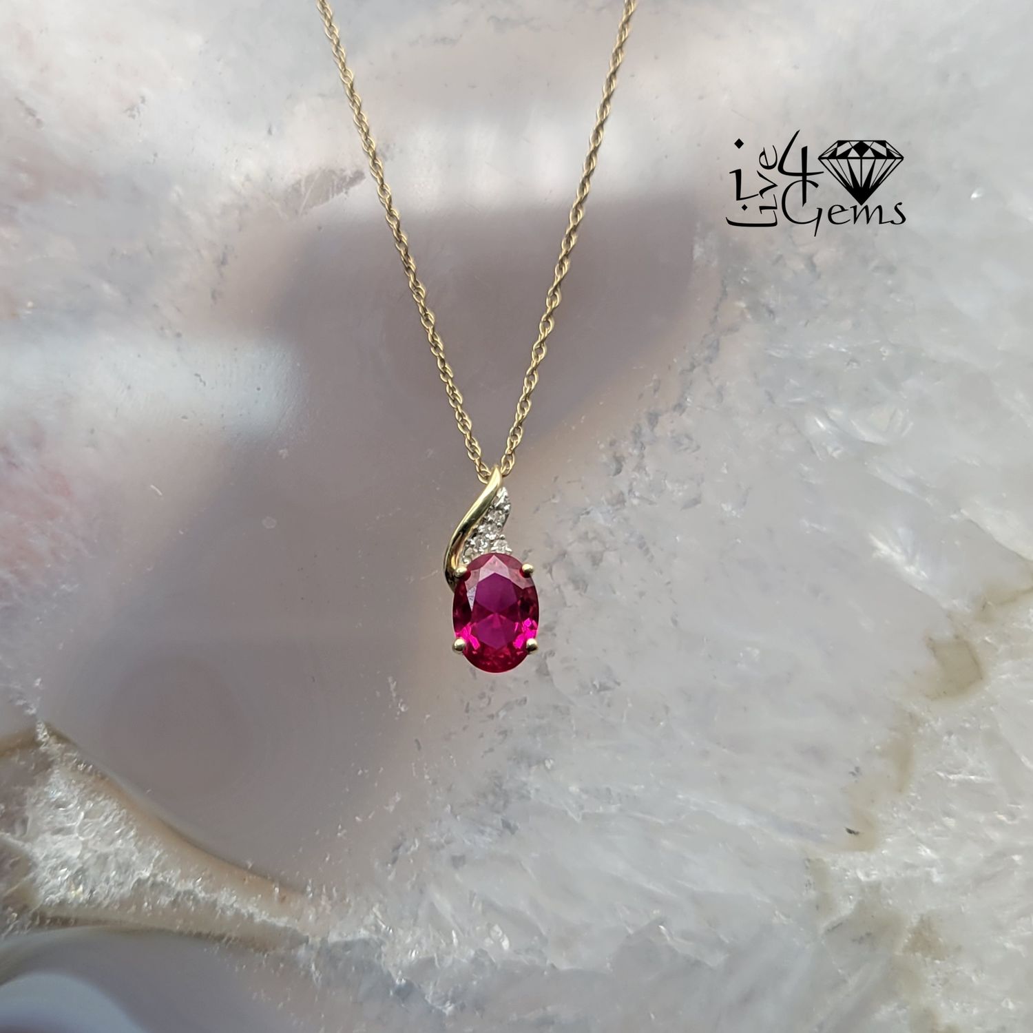10kty Oval Ruby and Spiral Dia Pendant/Chain