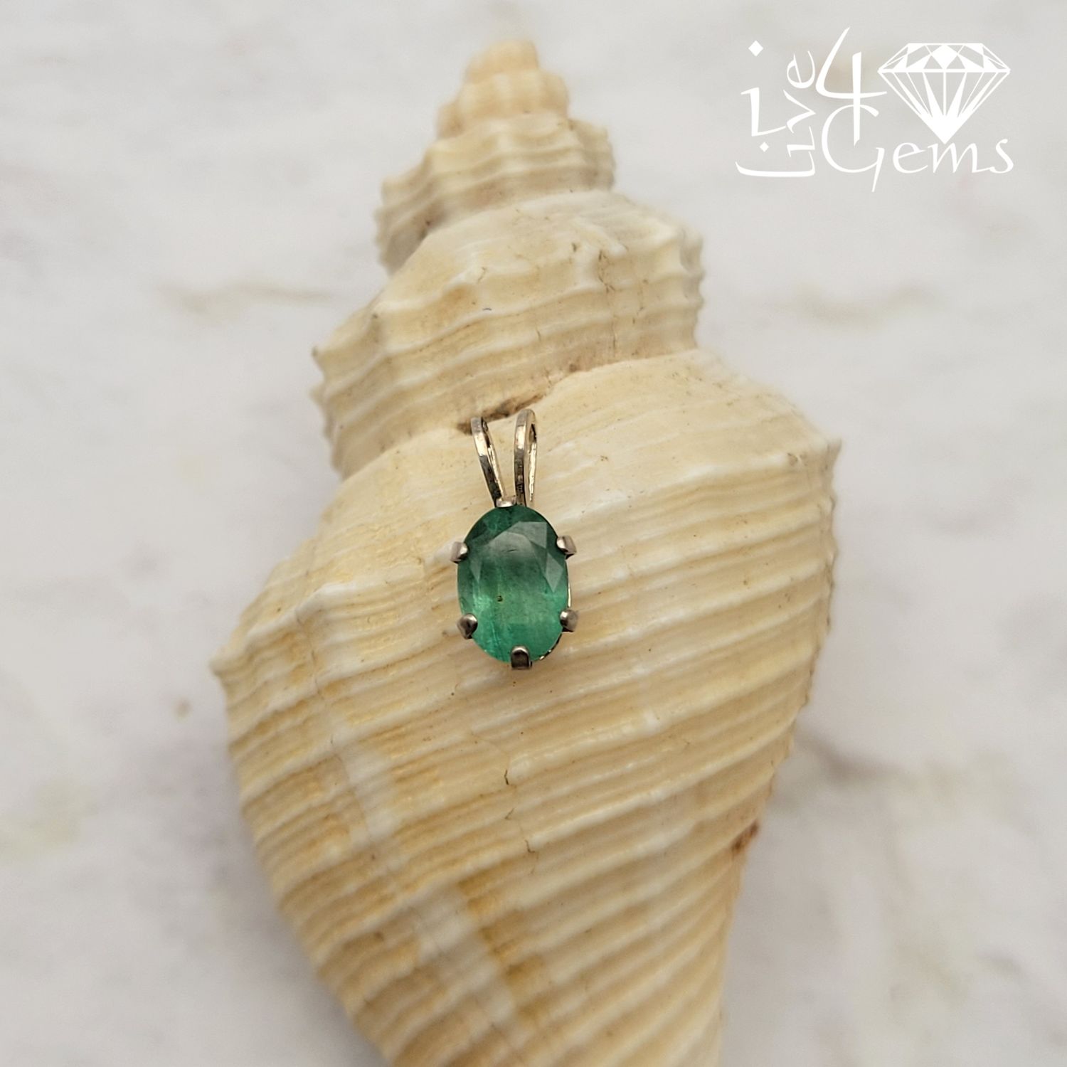 Silver Oval 7x5mm Emerald Pendant