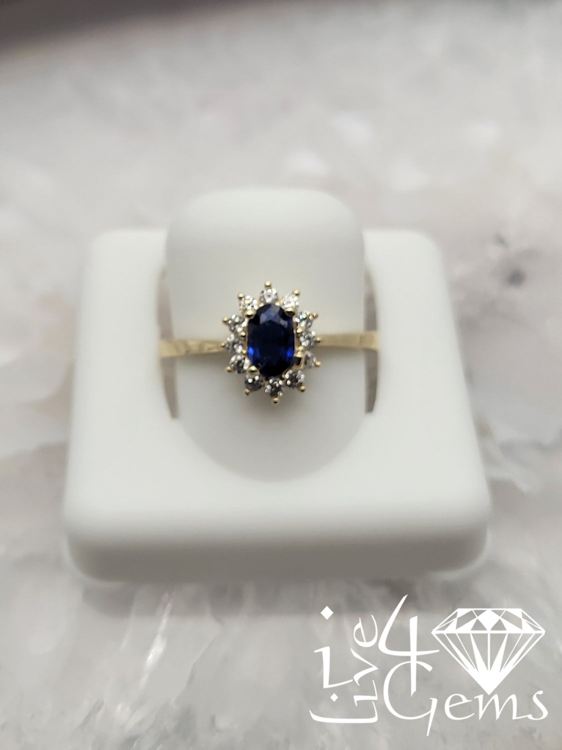10kty Blue Cz Oval Halo Ring S6.5