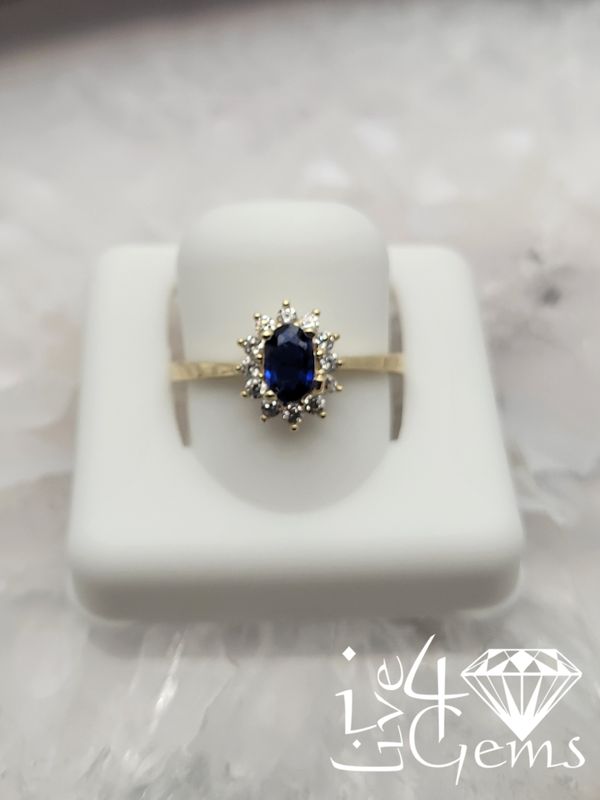 10kty Blue Cz Oval Halo Ring S6.5