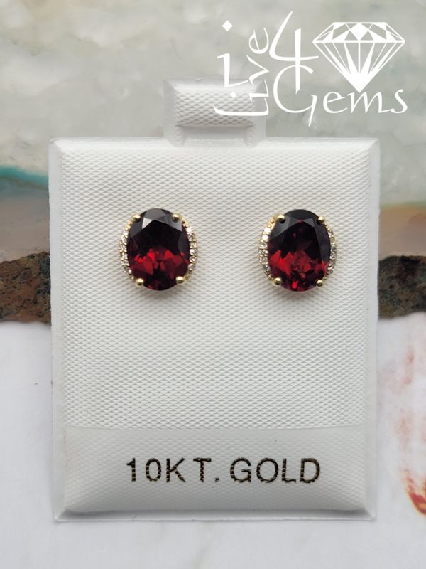 10kty Oval Garnet 0.10ctw Diamond Stud