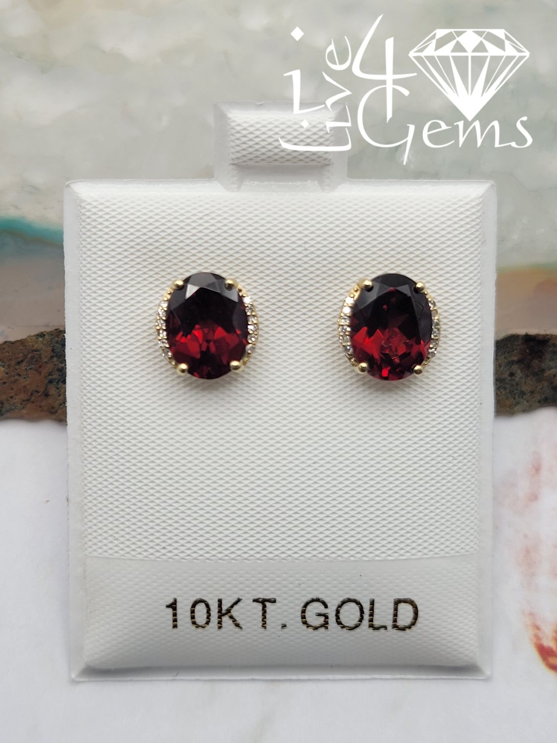 10kty Oval Garnet 0.10ctw Diamond Stud