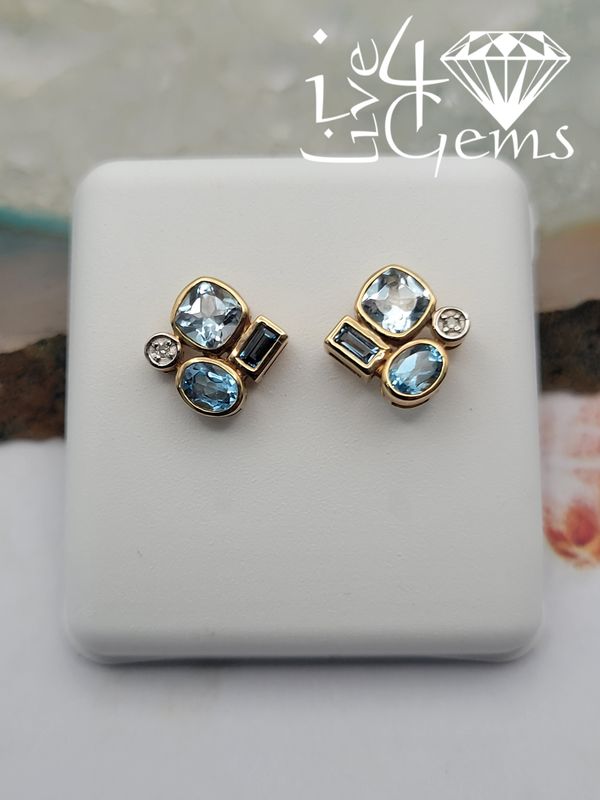10kty Baguette Blue Topaz and Diamond Stud