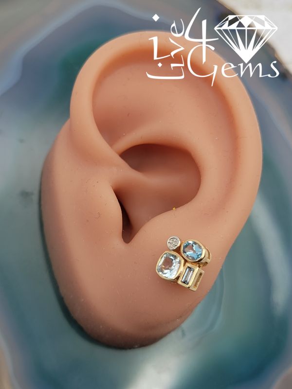 10kty Baguette Diamond and Blue Topaz Stud