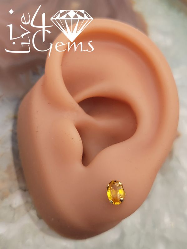 10kty 6x4mm 1.05ct Yellow Sapphire Oval Stud Earrings