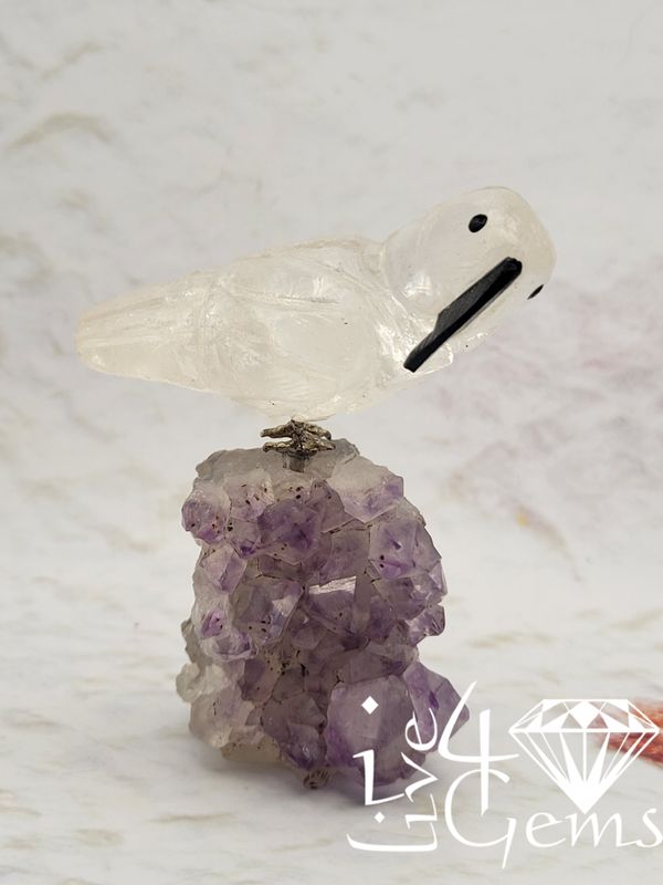 Gemstone Bird Carving on Amethyst