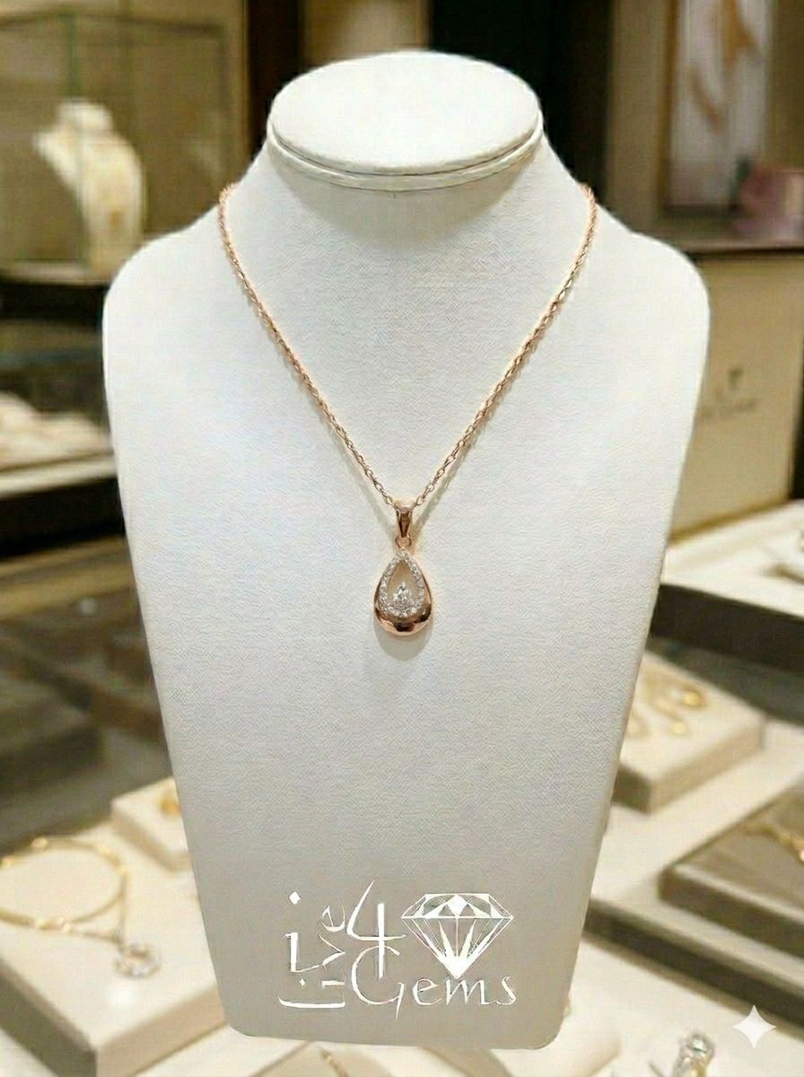 10kt Rose Gold Solitaire 1/10ctw Diamond Tear Drop Pendant and Chain
