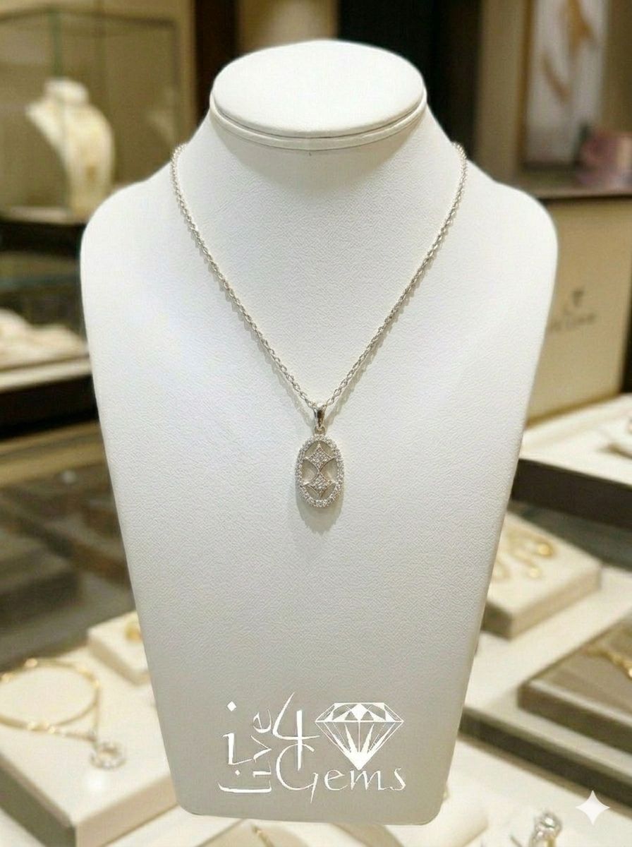 10kt White Gold Diamond Oval with Double Solitaire Pendant and Chain 1/12ctw