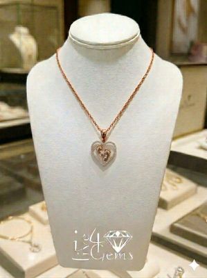 10kt Rose Gold Diamond Footsteps Heart Pendant and Chain 1/3ctw