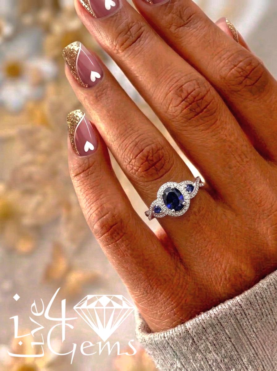 10kt White Gold Oval Triple Synthetic Sapphire and Diamond Ring 1/5ctw