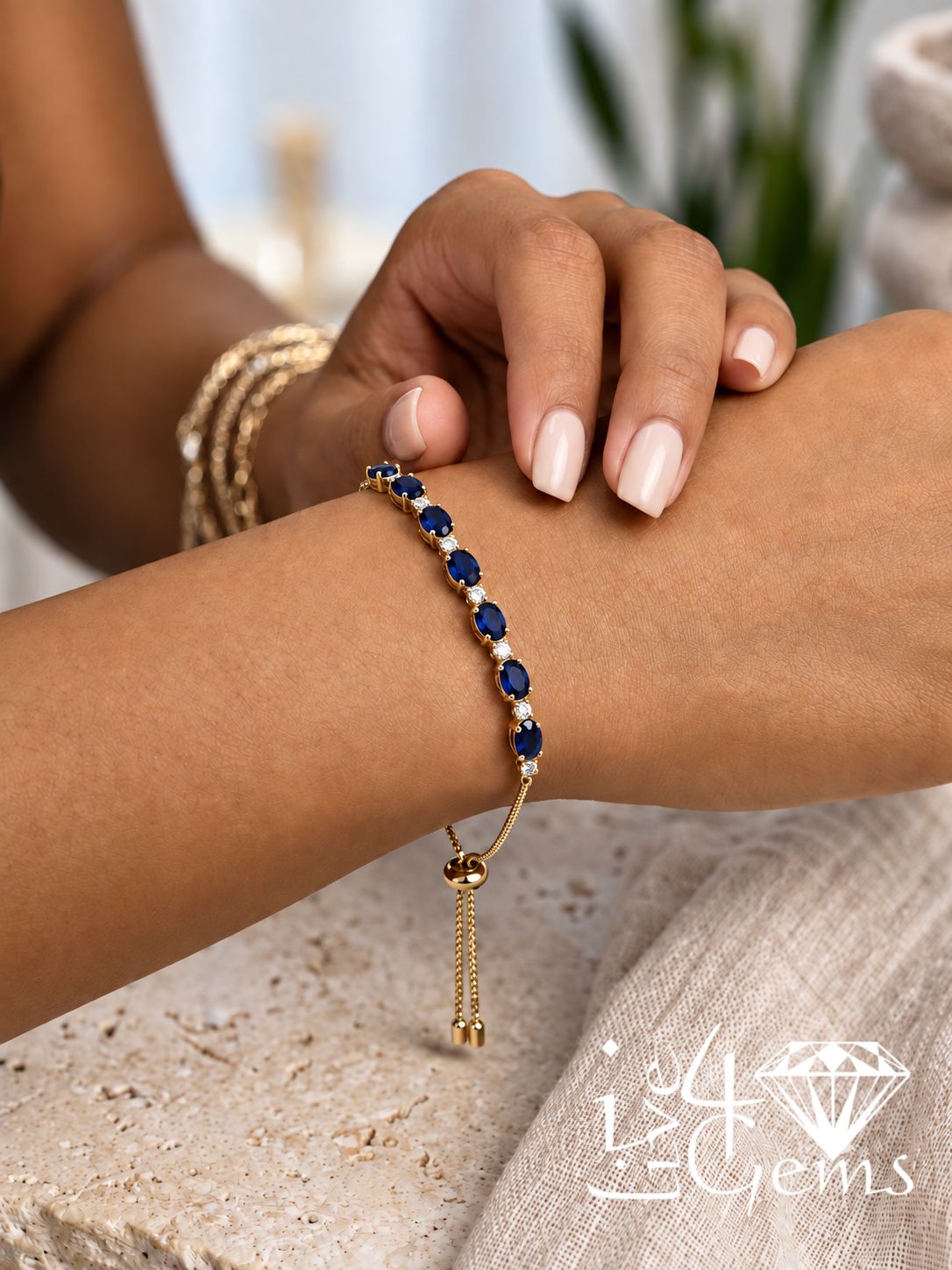 10kty 0.25ctw Diamond and Sapphire Gemstone Bolo Bracelet