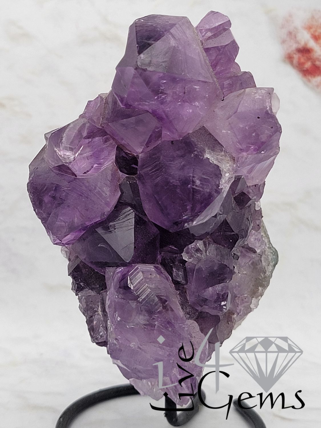 Natural Amethyst Geode on Black Metal Base