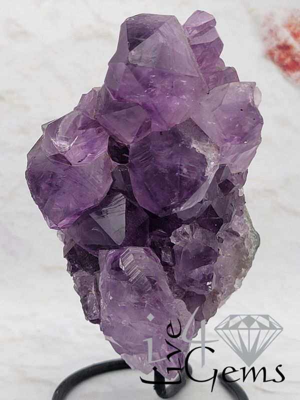 Natural Amethyst Geode on Black Metal Base