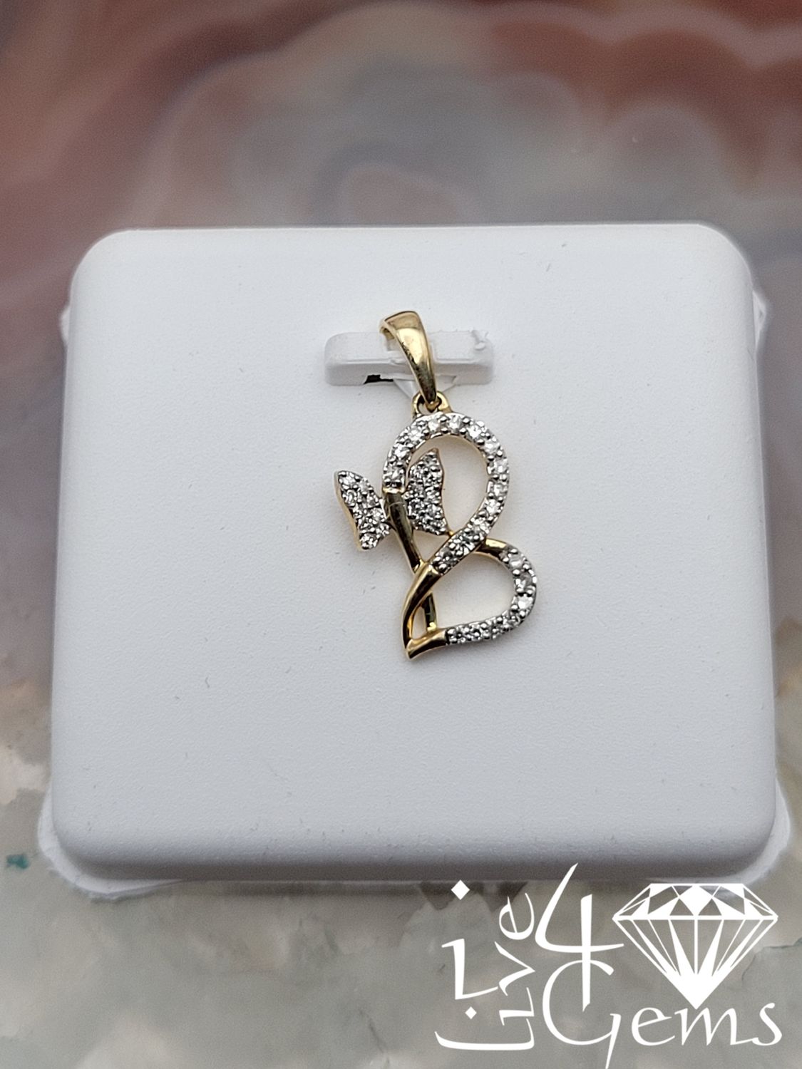 10kty 1/8ctw Diamond Heart Butterfly Pendant