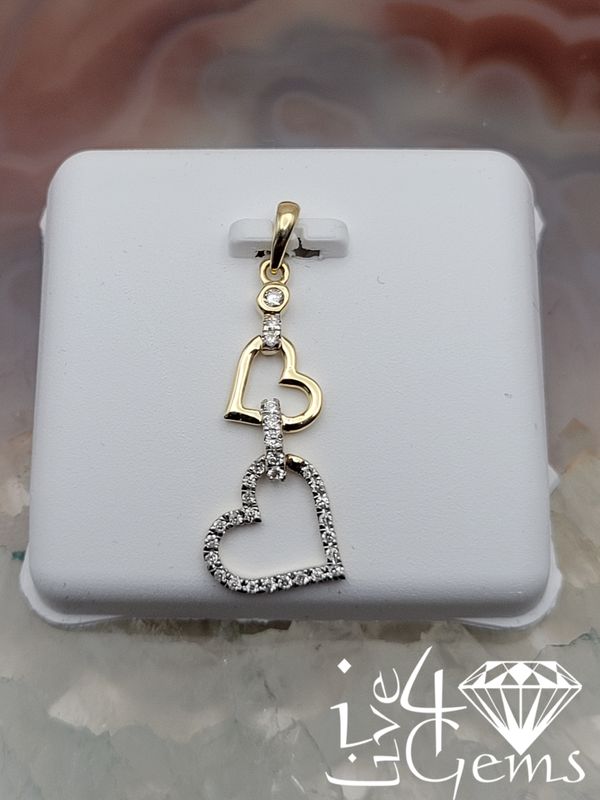 10kty 1/6ctw Diamond Heart Dangle Pendant