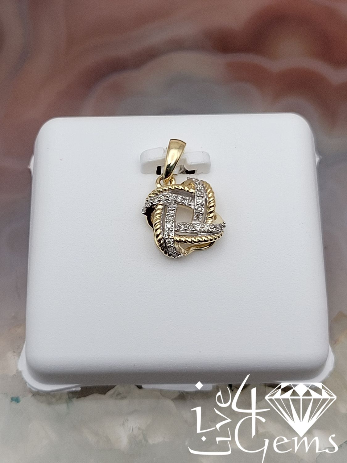 10kty 1/10ctw Diamond Celtic Knot Pendant