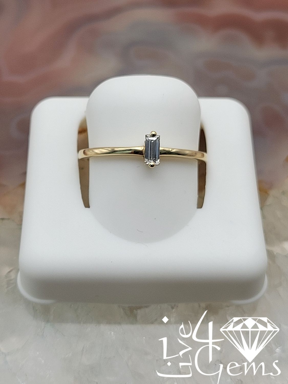 10kty 0.1ctw Diamond Baguette Solitaire Ring