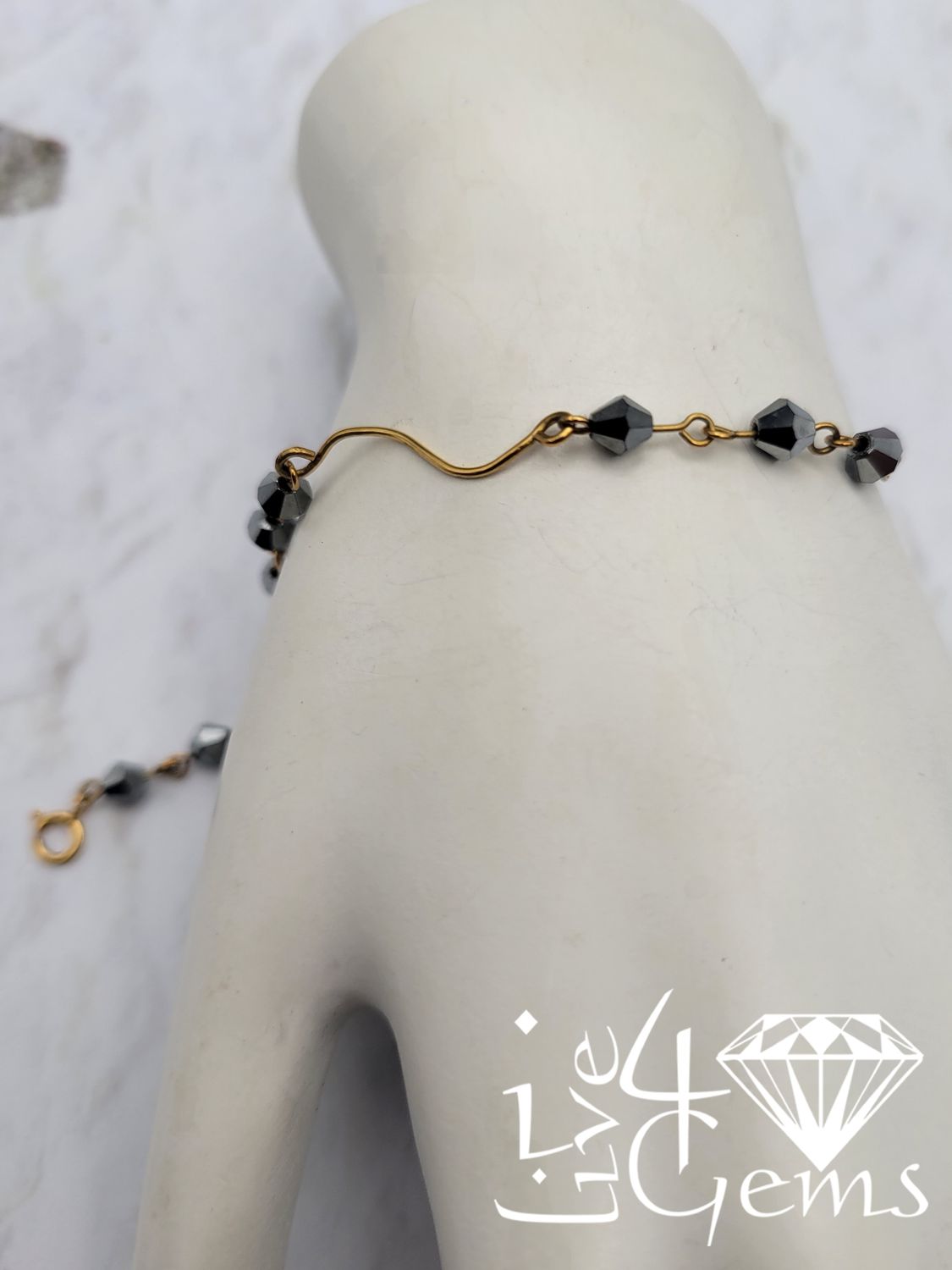 10kty Gold Spiral Hematite Bracelet