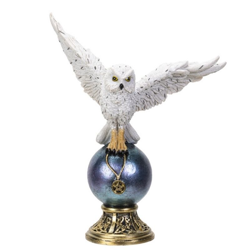 Snow Owl On Blue Globe