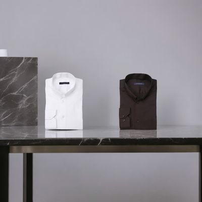 Chemise 100% Cotton manches longues Col inversé.