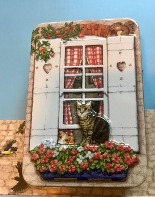 Embossed cat window tin, style: Tabby Cat