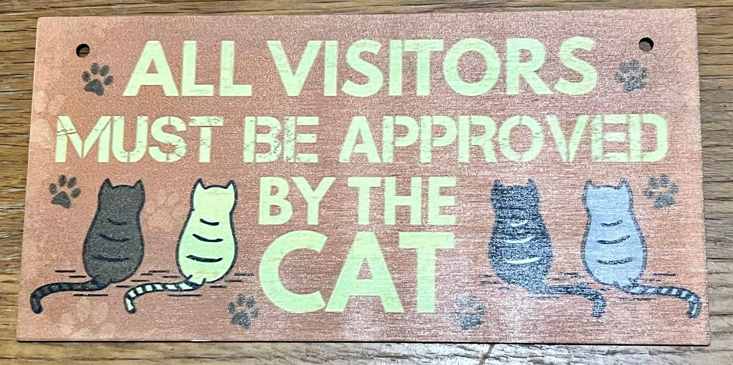 "All Visitors" wooden cat sign