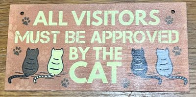 "All Visitors" wooden cat sign
