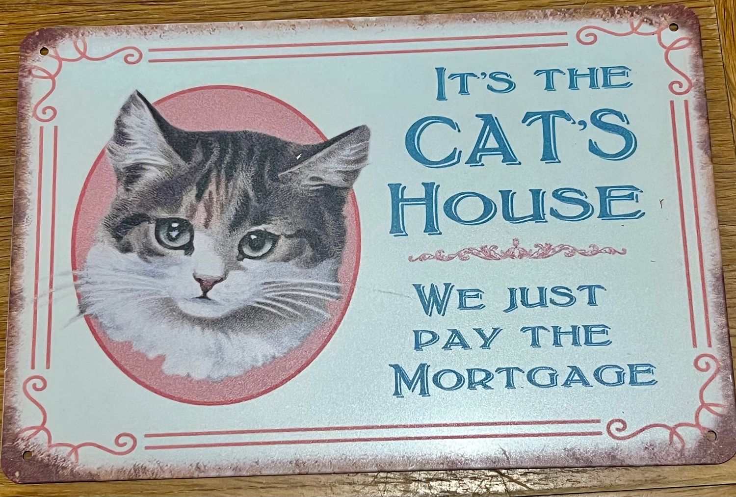 "It's The Cat's House" vintage tin sign