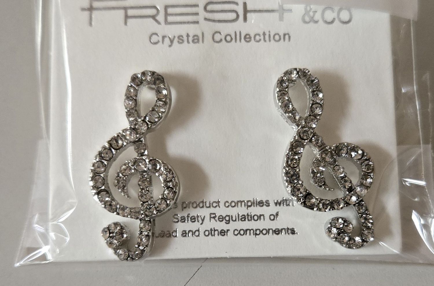 Crystal Paved Treble Clef stud earrings