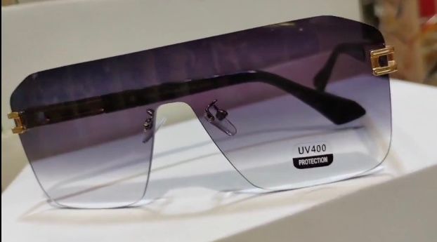 Fashion sunglasses - one-piece frameless glasses for Women/Men.