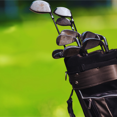 rental bag with balls, clubs and tees