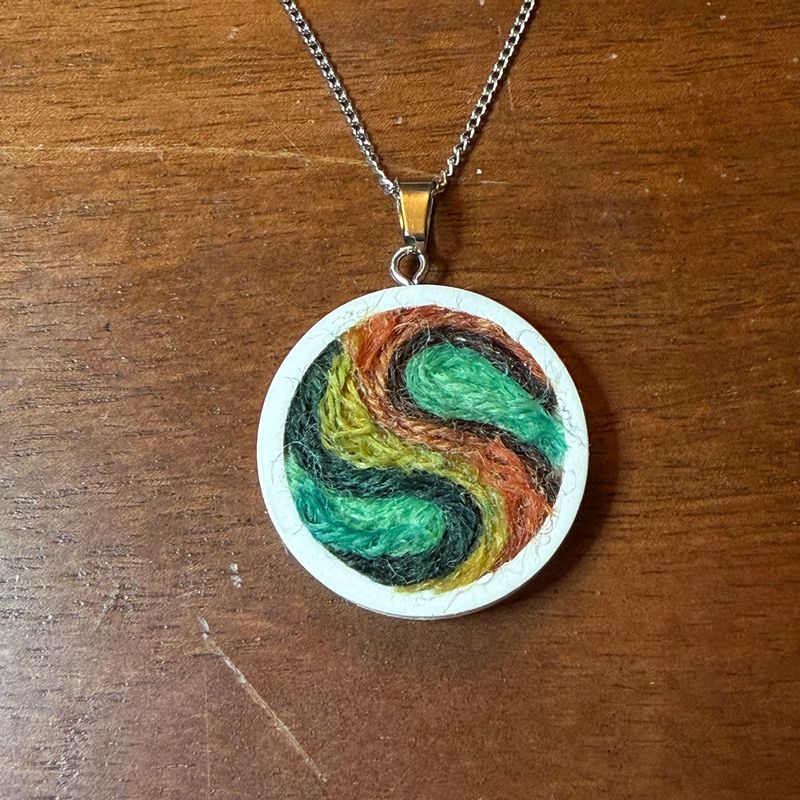 Abstract Swirl Earth Tones In Fiber Necklace