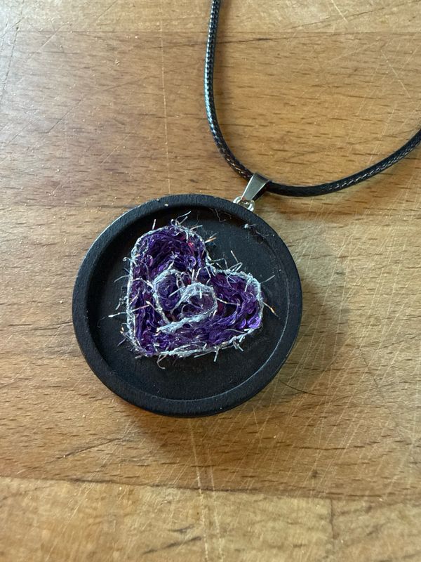 Abstract Swirl Ignites In Fiber Necklace