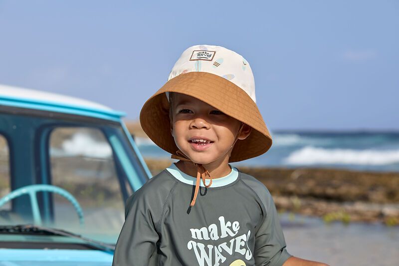 Lassig Uv hoedje ligt surfboard 3-6jaar