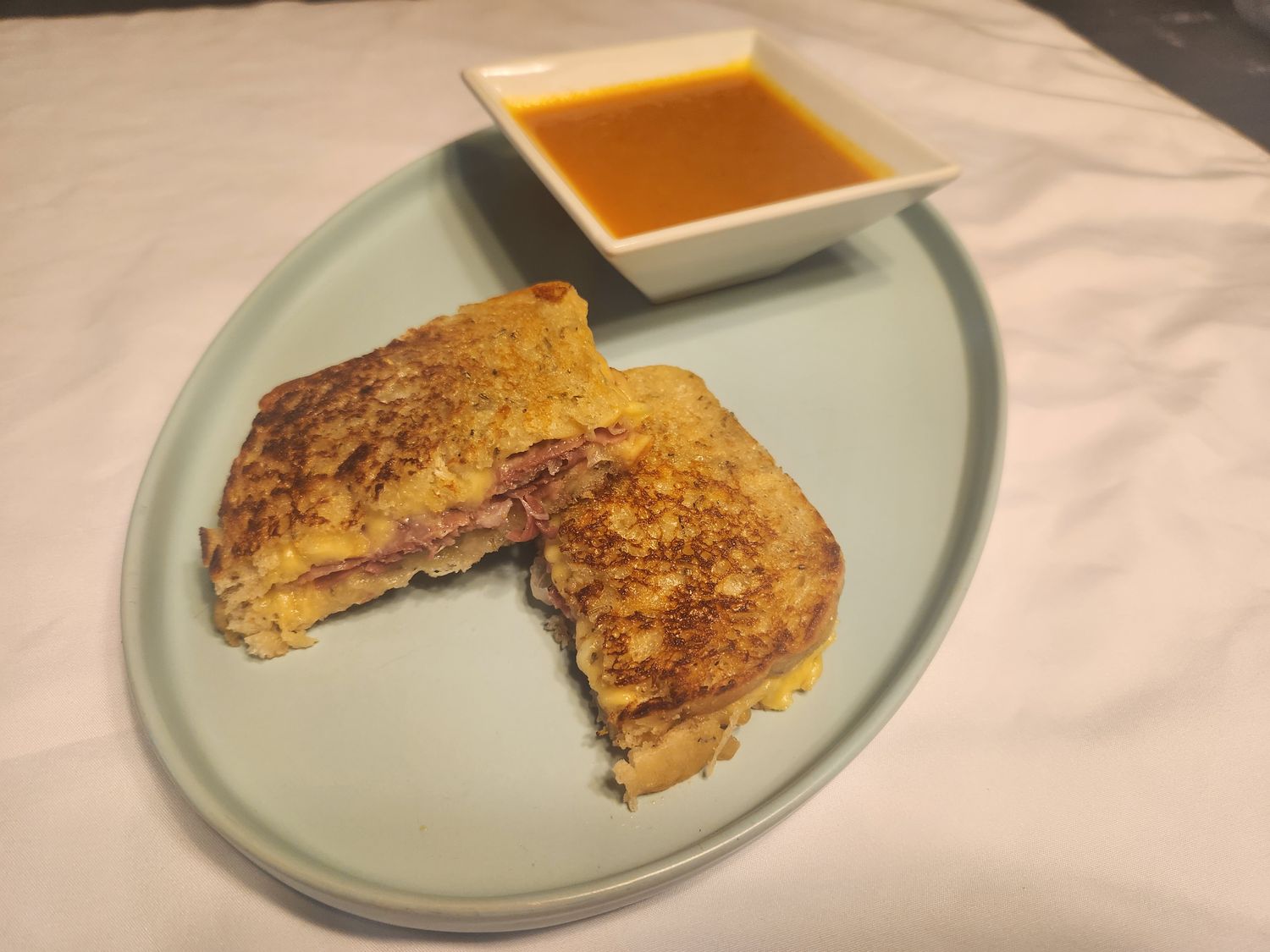 Rosemary, Prosciutto, and Gouda grilled cheese,  8 oz bowl of &quot;ShellB3ll&#39;s Original Yellow Tomato Soup and a sweet treat