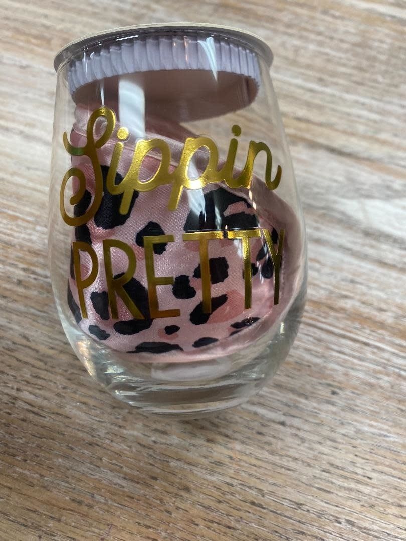 Sippin pretty wine glass and face mask