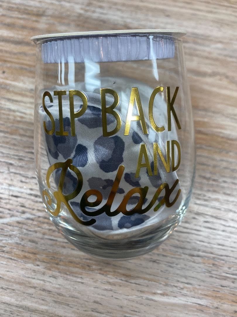 Sip back and relax wine glass and mask