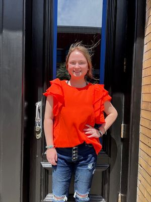 Livi Orange Ruffle Keyhole Top