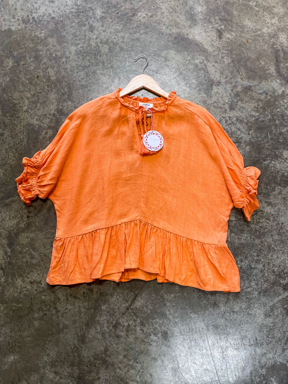 PEACH FRONT TASSLE TIE TOP